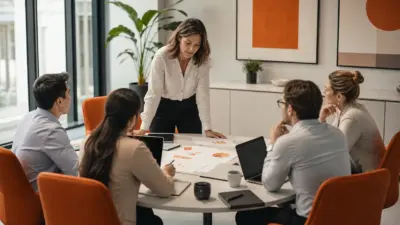 HR dan leader penjualan berdiskusi di kantor modern tentang penguatan mindset penjual di tengah dinamika ekonomi dan politik