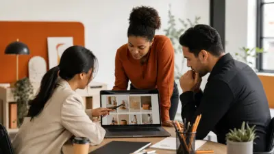 HR dan pelaku UMKM berdiskusi di kantor modern sambil meninjau strategi visual marketing untuk menonjolkan nilai produk lokal